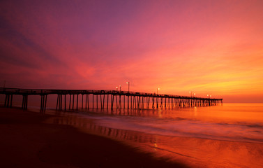 Fototapeta na wymiar FIshing pier at sunrise Nags Head , North Carolina, USA, North America