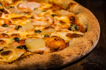 Fresh pizza made in a small bakery