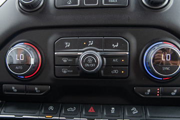 Close up of dusty control panel of a new vehicle