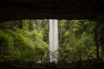 USA, Oregon, Silver Falls State Park. North Falls seen from inside cave. 