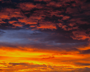 Fototapeta premium USA, Oregon, Bend. Colorful layers of clouds fill the morning sky in central Oregon.