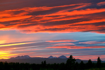 USA, Oregon, Bend. Brilliant colors compete with subtle ones over the Cascades Range of central Oregon. © Ric Ergenbright/Danita Delimont