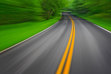 Blurred motion view of U. S. 441 through the Great Smokies National Park, from a moving automobile, Tennessee