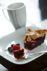 USA, Oregon, Keizer, a piece of raspberry, blueberry pie and a cup of coffee.