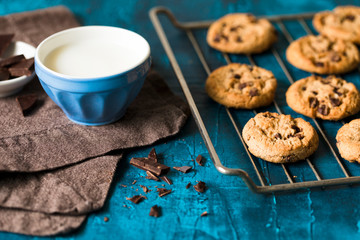 Chocolate chip cookies on a blue wooden table