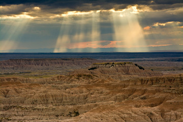 Approaching storm and crepuscular rays, sunset, Pinnacles Viewpoint, Badlands National Park, South Dakota, USA © Michel Hersen/Danita Delimont