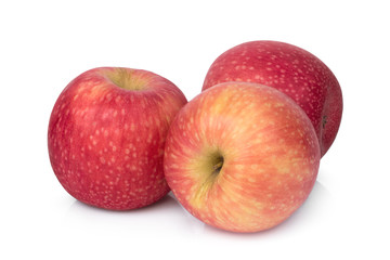 three whole pink lady apple isolated on white background