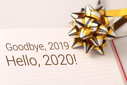 Goodbye 2019 and hello 2020 with gold decoration.