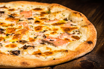 Fresh pizza made in a small bakery