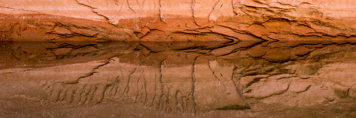 Usa, Utah, Glen Canyon National Recreation Area. Tapestry Wall area detail and reflections at sunrise.
