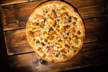 Fresh pizza made in a small bakery