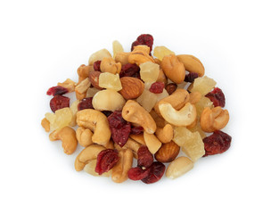 pile of mixed nuts and dried fruits isolated on white background, food for health, top view, flat lay
