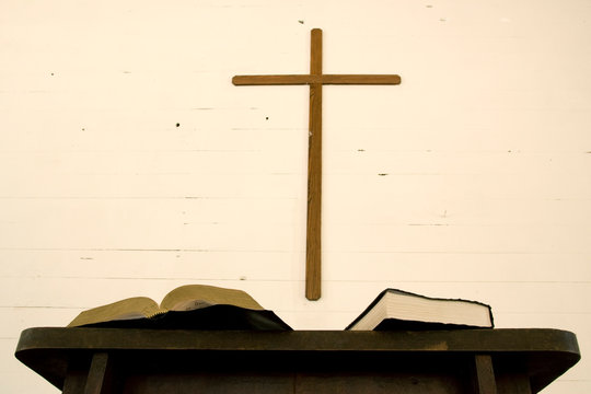 USA, Tennessee, Cades Cove. Close-up of cross, bible, book, and pulpit in church.