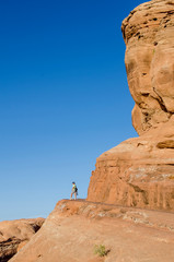 Hiking to Delicate Arch, Arches National Park, Utah, USA. (MR)