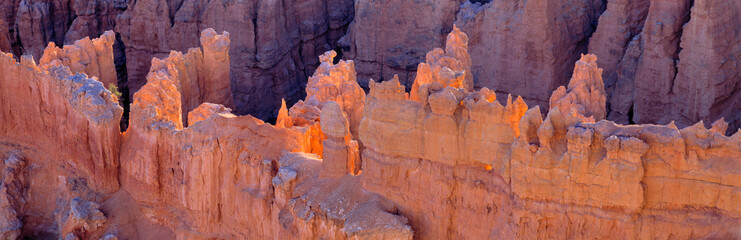 USA, Utah, Bryce Canyon NP. Backlit hoodoos appear to be touched by fire in Bryce Canyon National...