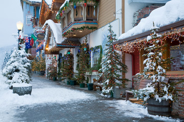 WA, Leavenworth, Bavarian style village, decorated with holiday lights