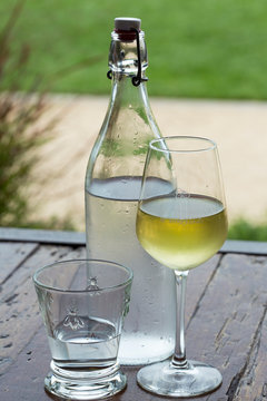 Pippen Hill Farm and Vineyard, North Garden, Virginia. White Wine and Water served in a white wine glass and water glass goblet