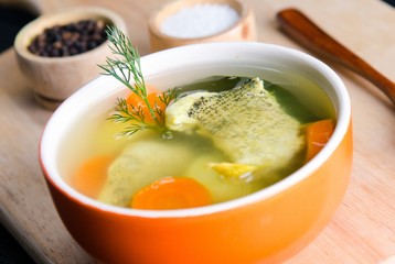 Fish soup served on the table in plate