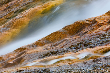 Hot water runoff from Excelsior Geyser and Grand Prismatic Spring, Midway Geyser Basin, Yellowstone...
