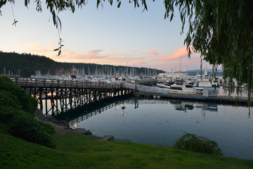 USA, Washington State. San Juan Island. Port of Friday Harbor docks at sunset