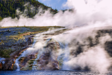 Hot water runoff from Grand Prismatic Spring and Excelsior Geyser, Midway Geyser Basin, Yellowstone...