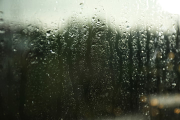 Blurred view from window on rainy day