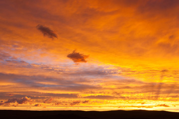 Wyoming, Sublette County, Landscape of sunset over silhouetted ridgeline.