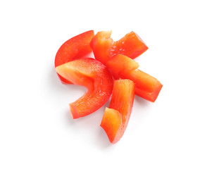 Slices of ripe red bell pepper on white background