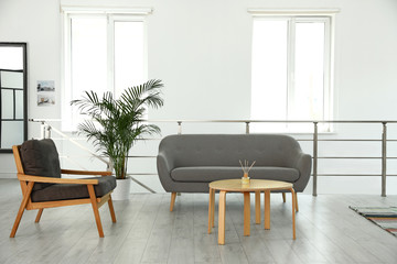 Modern living room interior with comfortable furniture