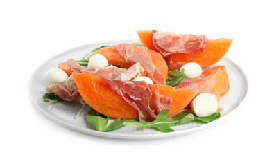 Fresh melon with prosciutto, mozzarella and arugula on white background