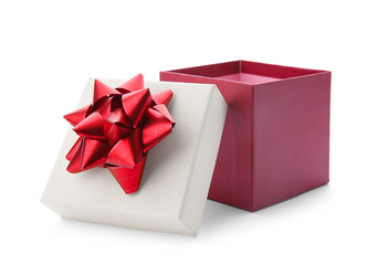 Beautiful gift box with bow on white background