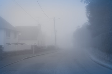 Heavy fog in the town of Perros-Guirec. Vintage style. Brittany. France