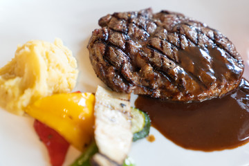 Delicious fresh beef steak with black pepper sauce dipping.