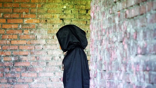 an evil monk in the hood