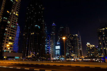 Fototapeta na wymiar View of the high-rise buildings of Dubai in the evening. Dubai Marina district.