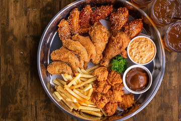 crispy fried chicken and  french fries 