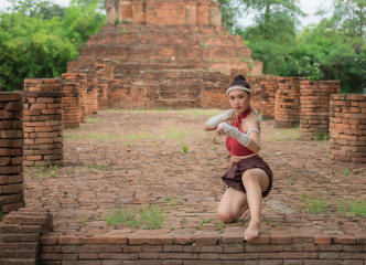 Thai Boxing Women prepare to training boxing and kickboxing for exercise at the old temple.