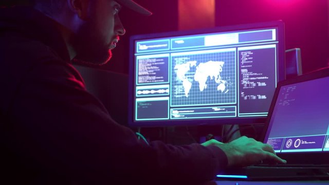 Hackers breaking server using multiple computers and infected virus ransomware. Cybercrime, information technology, phishing mail.
