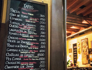 Tapas bar in Spain. Spanish tapas bar in historical center of Seville at night