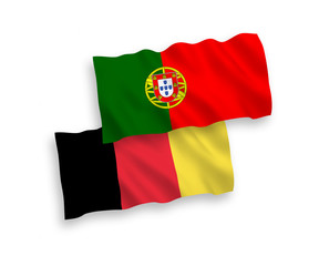 National vector fabric wave flags of Portugal and Belgium isolated on white background. 1 to 2 proportion.