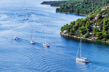 Beautiful bay with sailing boats, Croatia. Yachting sail boats near the croatian islands. Travel,...