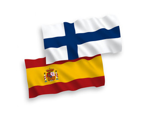 National vector fabric wave flags of Finland and Spain isolated on white background. 1 to 2 proportion.