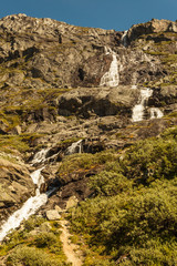 Waterfall in mountains. Norwegian route Sognefjellet