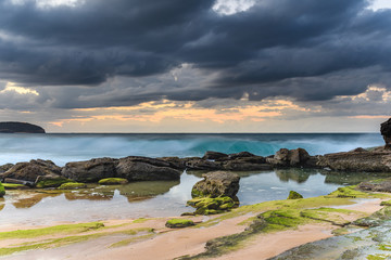 Winter Morning at the Seaside and Green Mossy Rocks