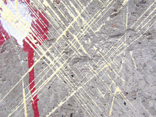   Colored stripes and stains of paint on a rough concrete wall. Leaked paint. Grunge geometrical pattern.     