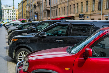 Saint-Petrsburg, Russia - August, 14, 2019: cars parking on the street in a center of Saint-Petrsburg, Russia