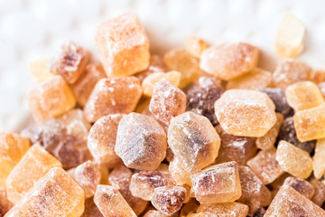 Cane sugar in crystal cubes, fragrant brown sugar for tea and coffee