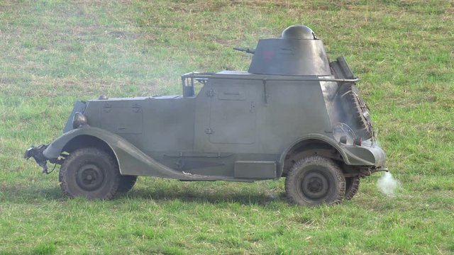 Armored vehicles. Old military equipment demonstrates its capabilities at the range 