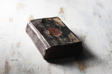 The Holay Quran,Antique Quran on a white wooden background