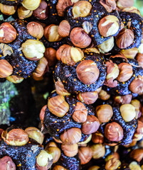 Slices of marmalade with hazelnuts. Hazelnut with sweets.